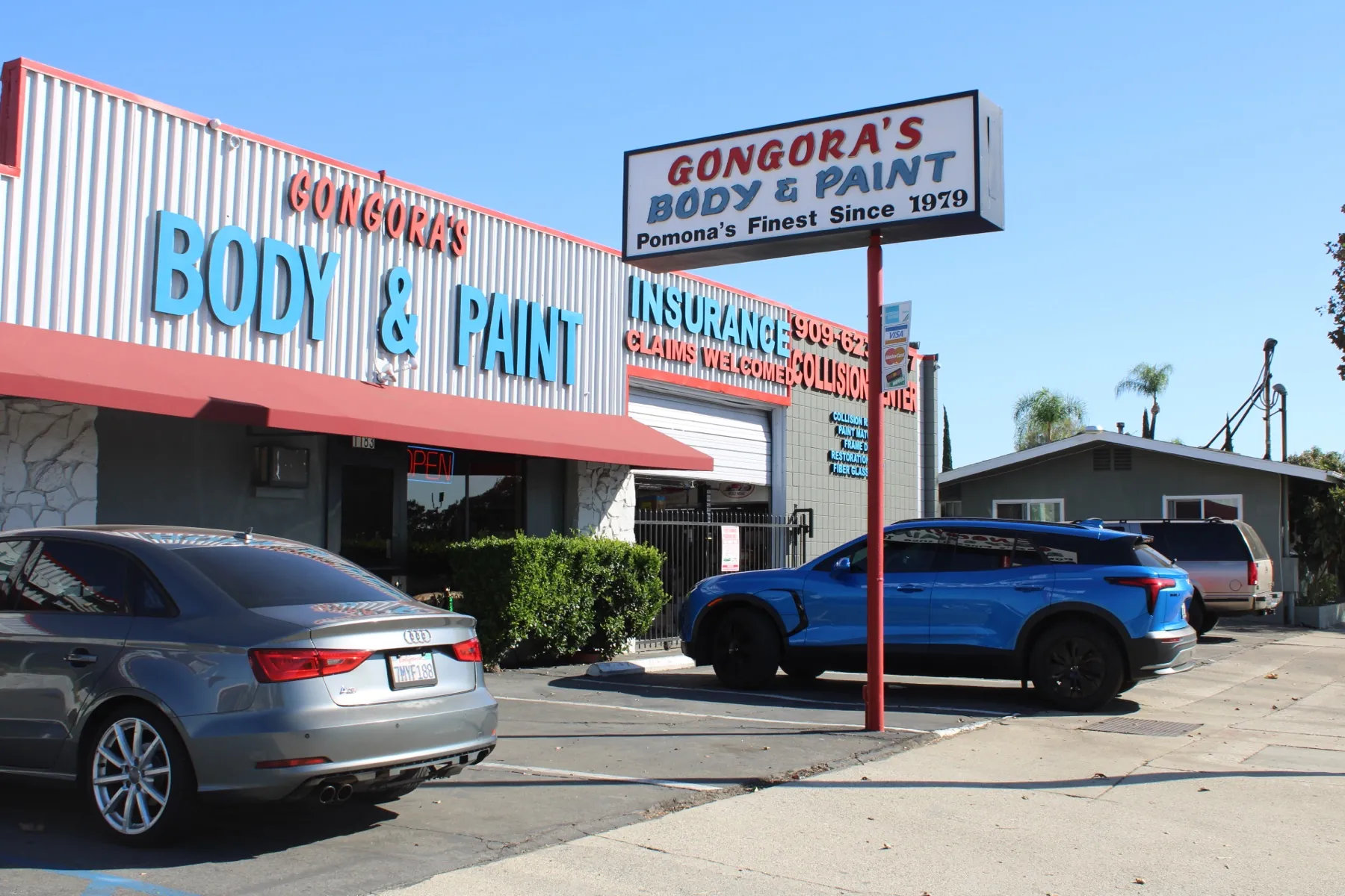 Gongora’s Body & Paint on Holt Avenue, with the Pomona’s Finest Since 1979 pole sign